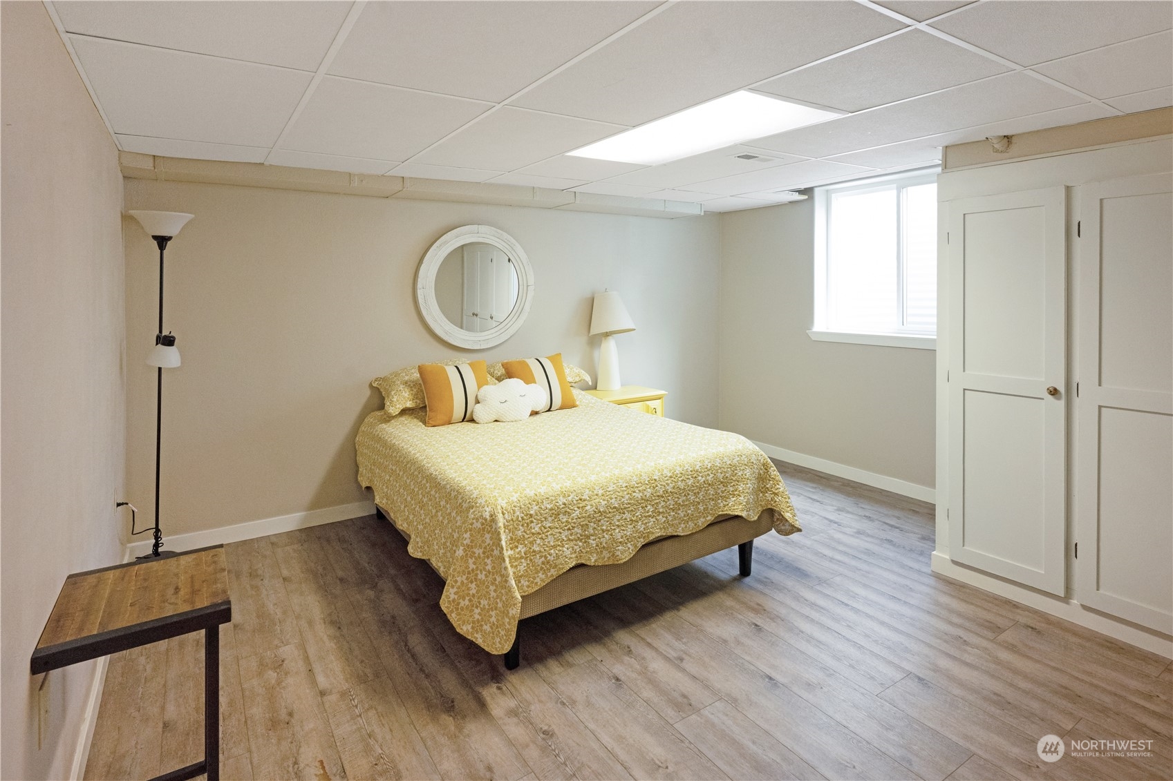 132 Swegle Road Walla Walla, WA 99362 - Photo 20 of 40 a bedroom with a bed and wooden floor