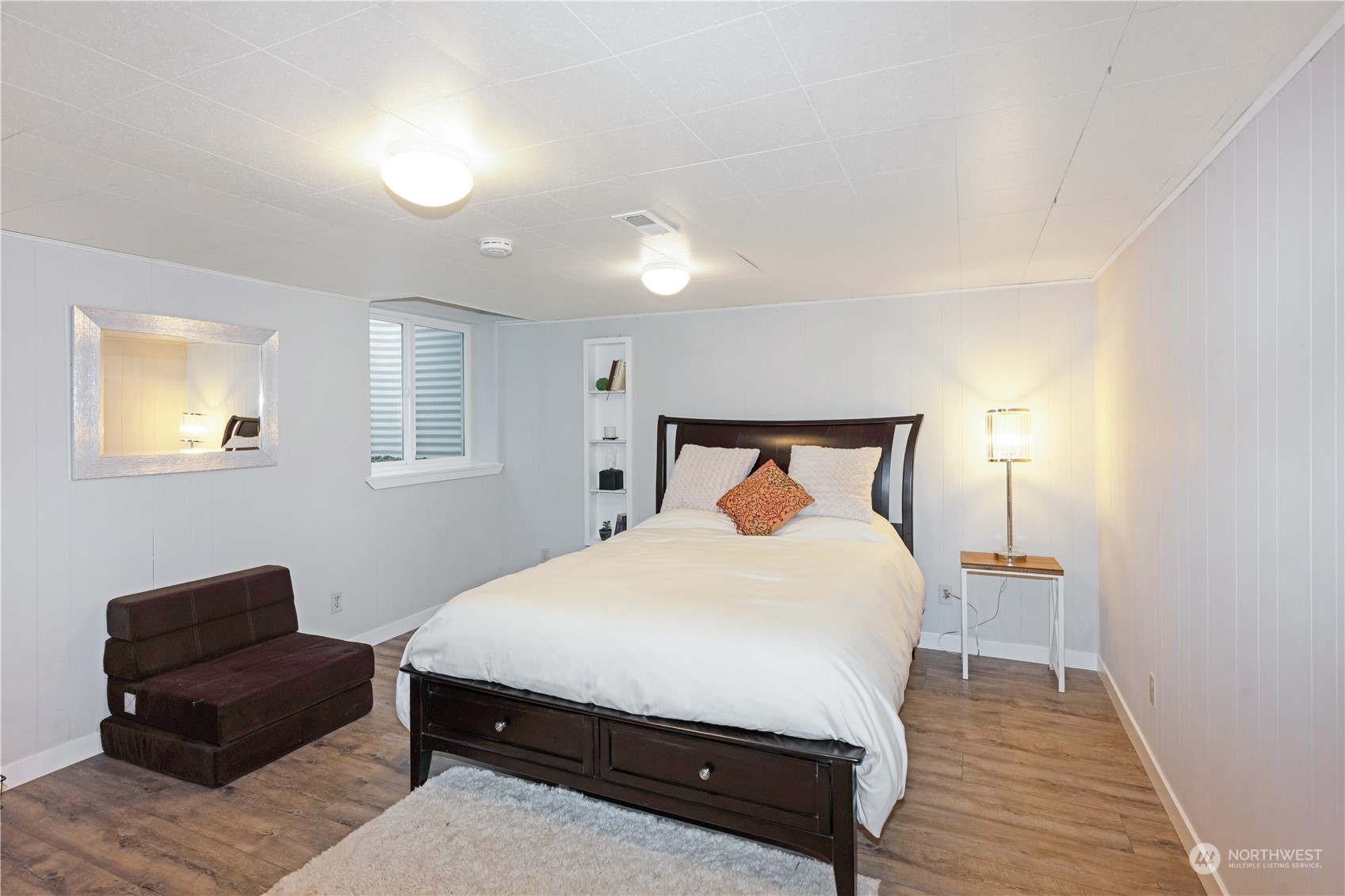 132 Swegle Road Walla Walla, WA 99362 - Photo 21 of 40 a bedroom with a bed and wooden floor