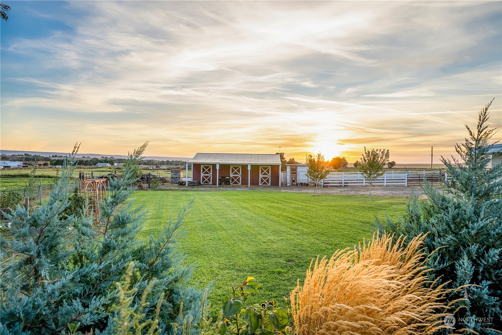132 Swegle Road Walla Walla, WA 99362 - Photo 30 of 40 a view of a big house with a big yard and large trees
