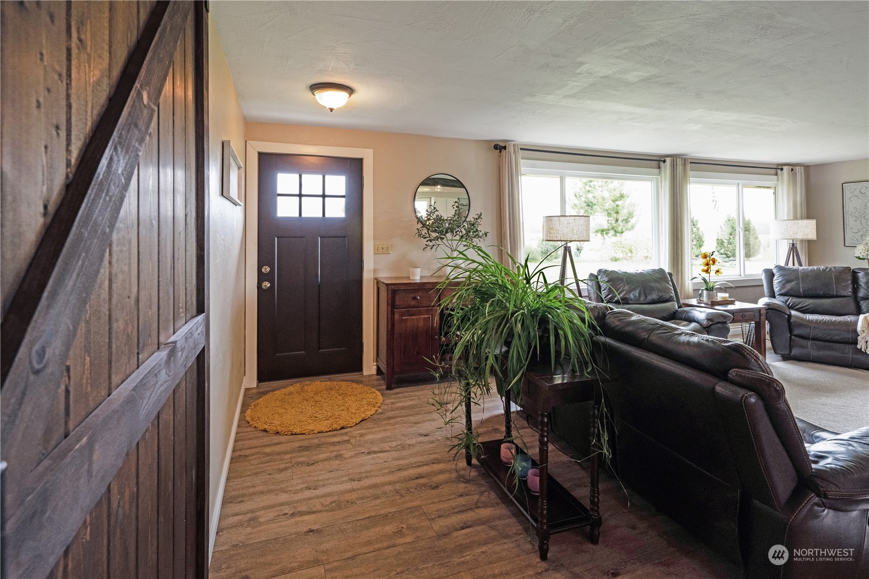 132 Swegle Road Walla Walla, WA 99362 - Photo 5 of 40 a living room with furniture and a potted plant