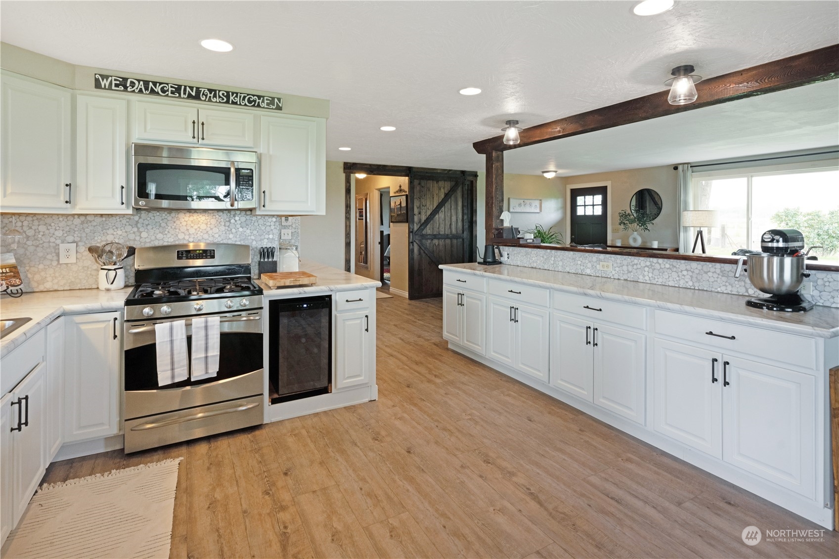 132 Swegle Road Walla Walla, WA 99362 - Photo 10 of 40 a kitchen with stainless steel appliances granite countertop a stove a sink and a microwave