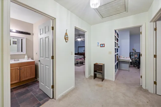 a view of an entryway with wooden floor