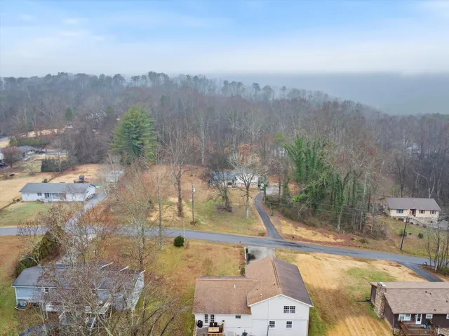 an aerial view of residential house with outdoor space