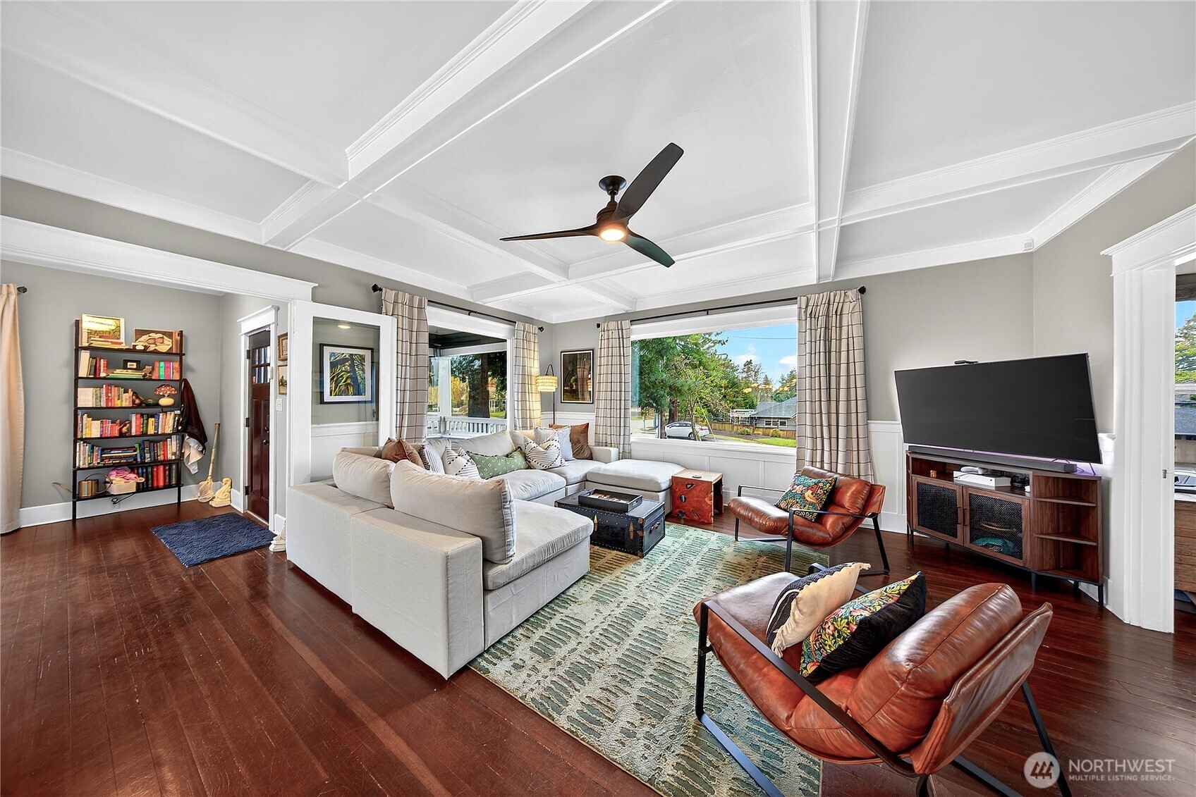 2120 12th Street Anacortes, WA 98221 - Photo 8 of 40 a living room with furniture and a flat screen tv