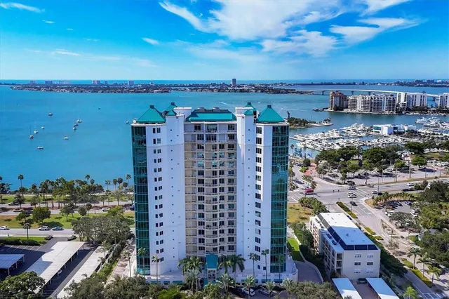 a view of a house with a large window and stairs