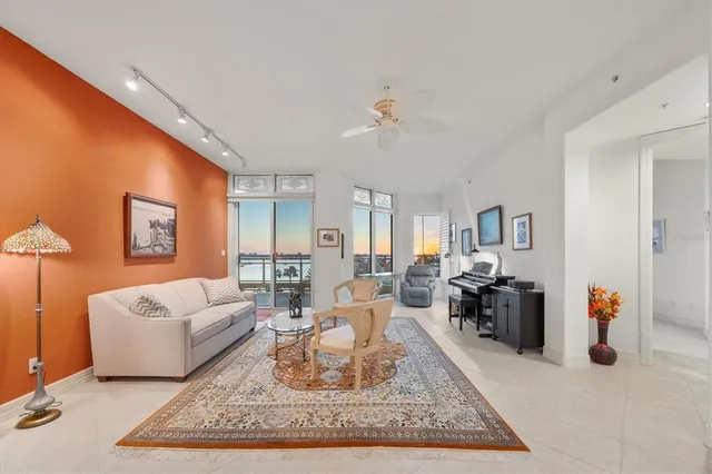 a living room with furniture and a rug