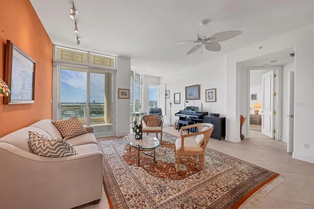 a view of a dining room with furniture and window