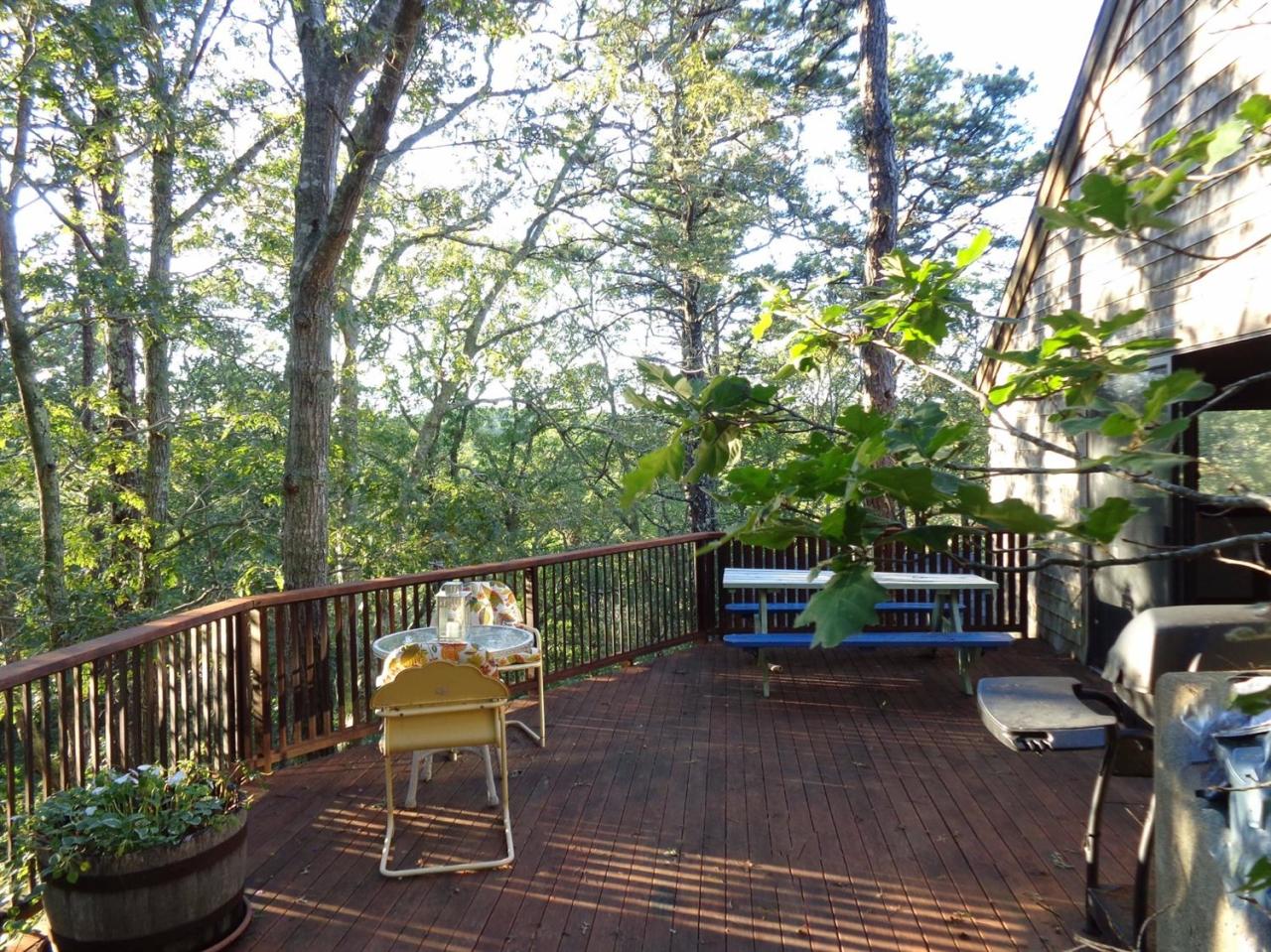 200 Gull Pond Road Wellfleet, MA 02667 - Photo 11 of 35 a view of a chairs and table in the balcony