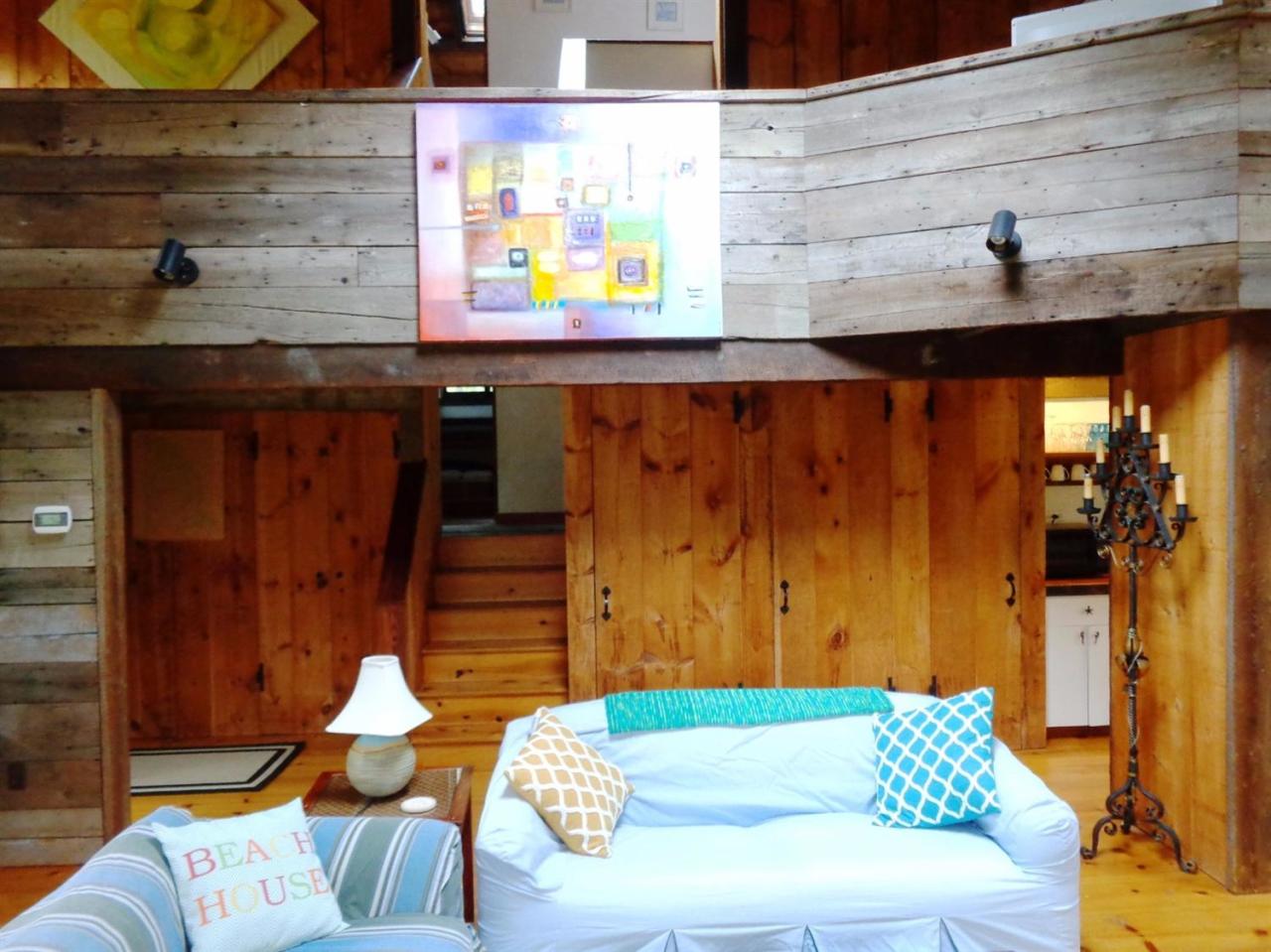 200 Gull Pond Road Wellfleet, MA 02667 - Photo 16 of 35 a view of a room with furniture and wooden floor