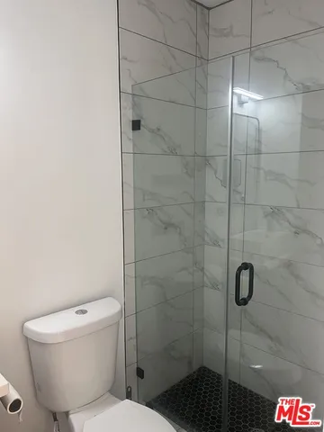 a view of a backyard of the house