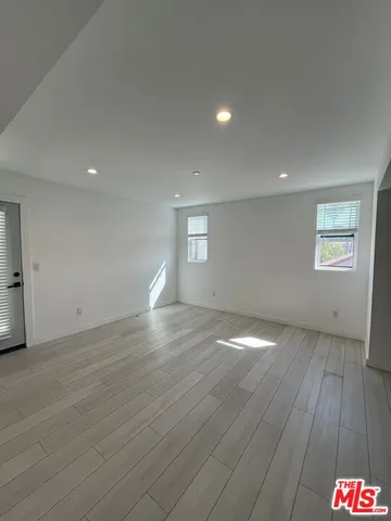 a view of an empty walk in closet