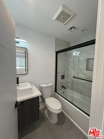 a view of a dinning tables and chair in the balcony