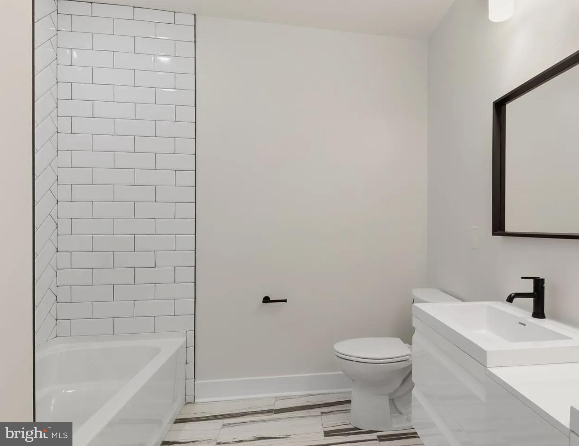 2719 Lefevre Street Philadelphia, PA 19137 - Photo 21 of 33 Sleek modern bathroom with clean lines.