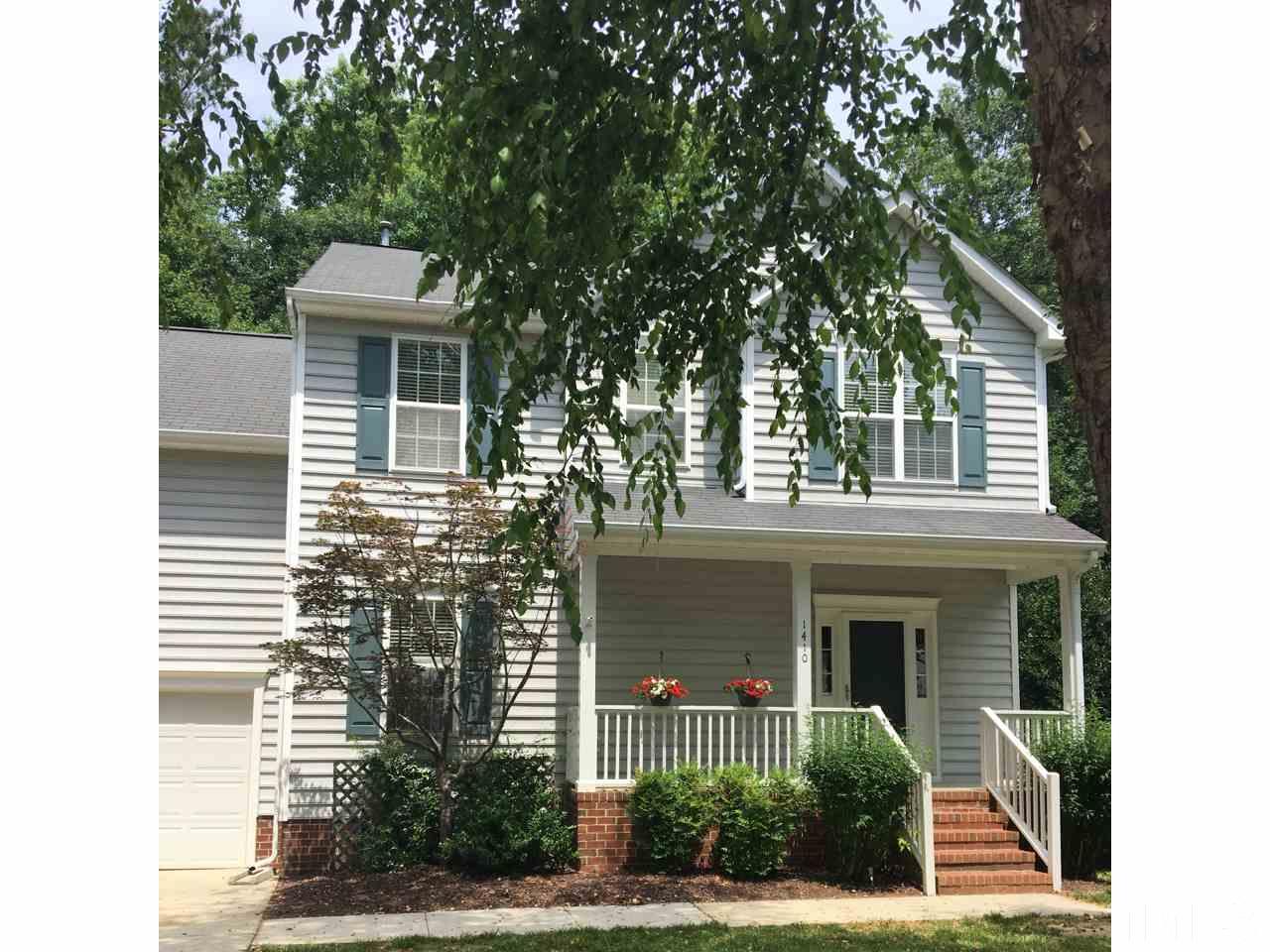 1410 Big Leaf Loop Apex, NC 27502 - Photo 2 of 20 a front view of a house with a yard