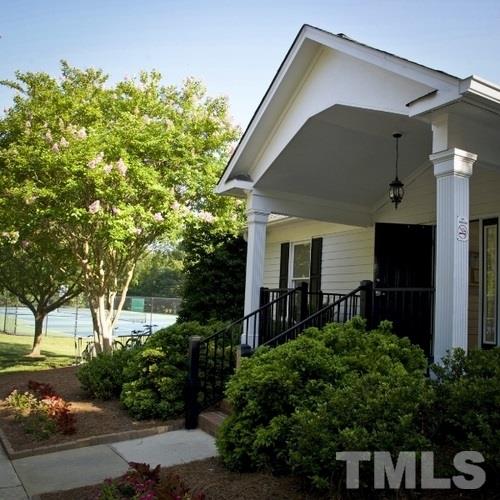 1410 Big Leaf Loop Apex, NC 27502 - Photo 18 of 20 a front view of a house with garden