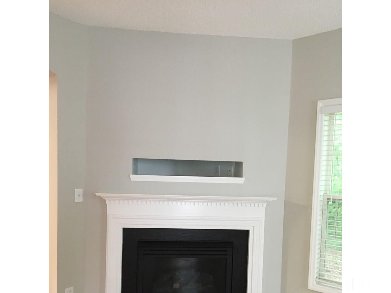 1410 Big Leaf Loop Apex, NC 27502 - Photo 9 of 20 a close view of a fireplace