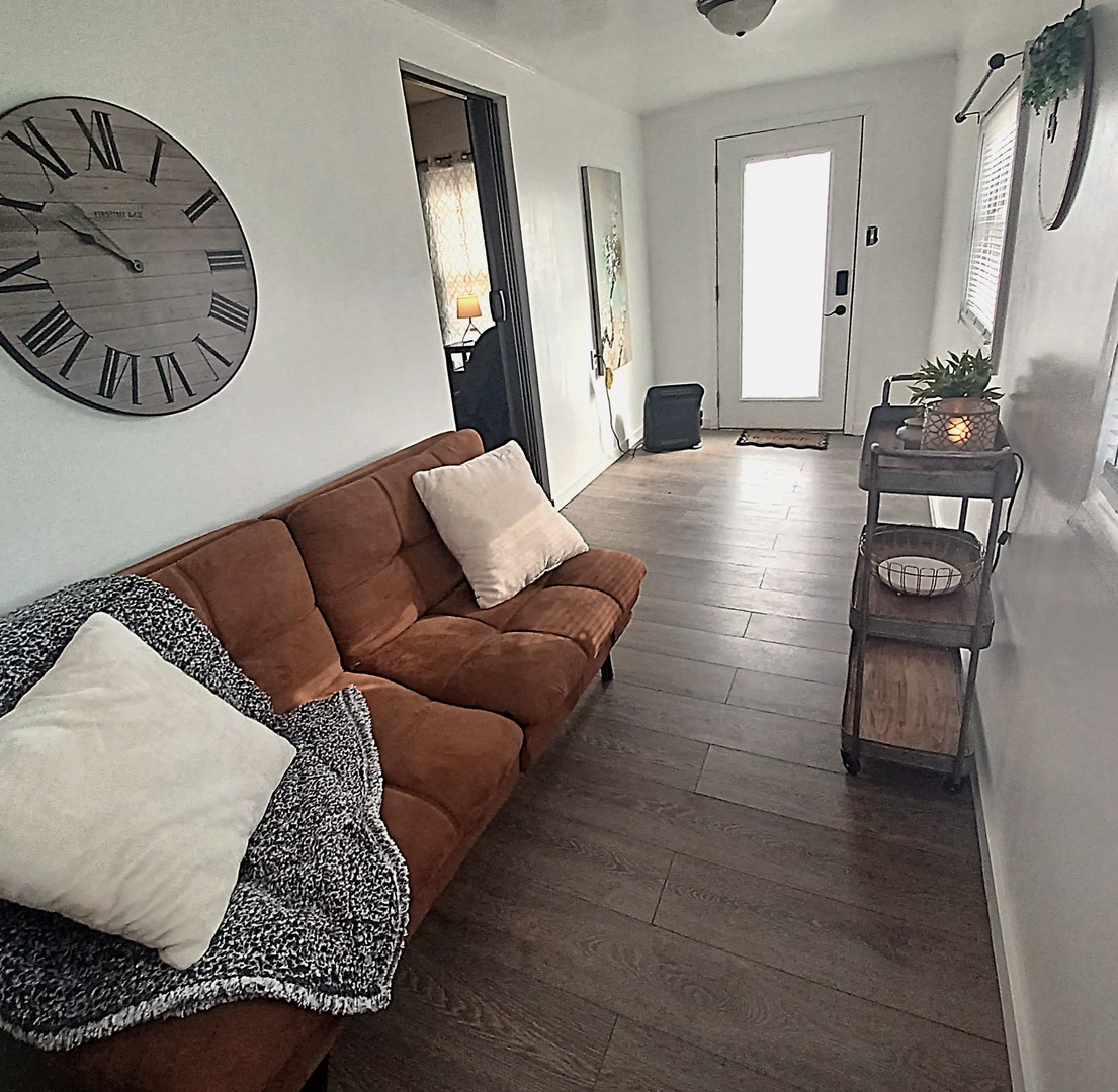 122 South Beach Street Kewanee, IL 61443 - Photo 18 of 49 a living room with furniture and wooden floor