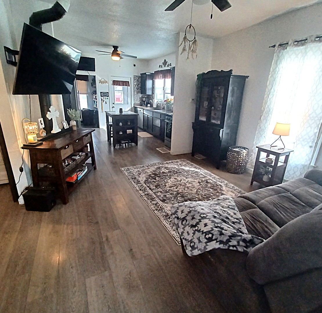 122 South Beach Street Kewanee, IL 61443 - Photo 21 of 49 a living room with furniture and a flat screen tv