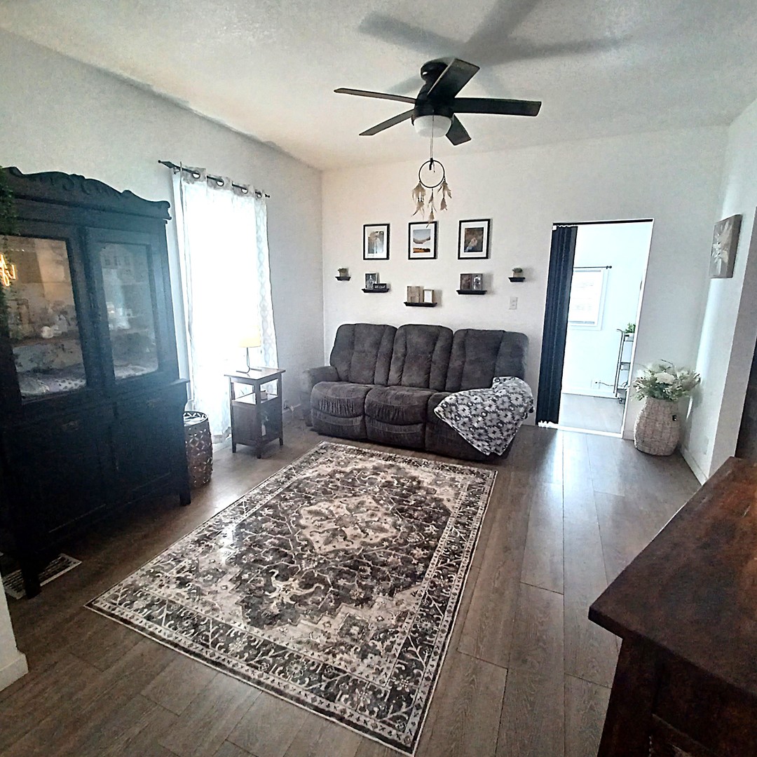 122 South Beach Street Kewanee, IL 61443 - Photo 24 of 49 a living room with furniture and wooden floor
