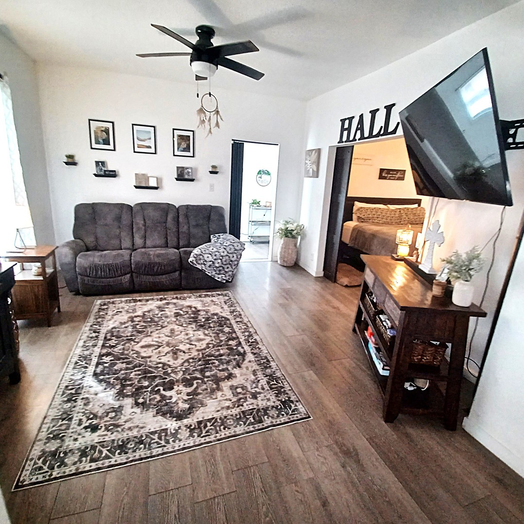 122 South Beach Street Kewanee, IL 61443 - Photo 25 of 49 a living room with furniture and a flat screen tv