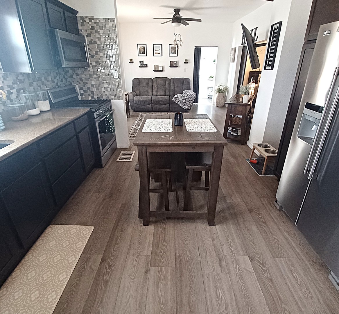 122 South Beach Street Kewanee, IL 61443 - Photo 30 of 49 a dining room with furniture and wooden floor