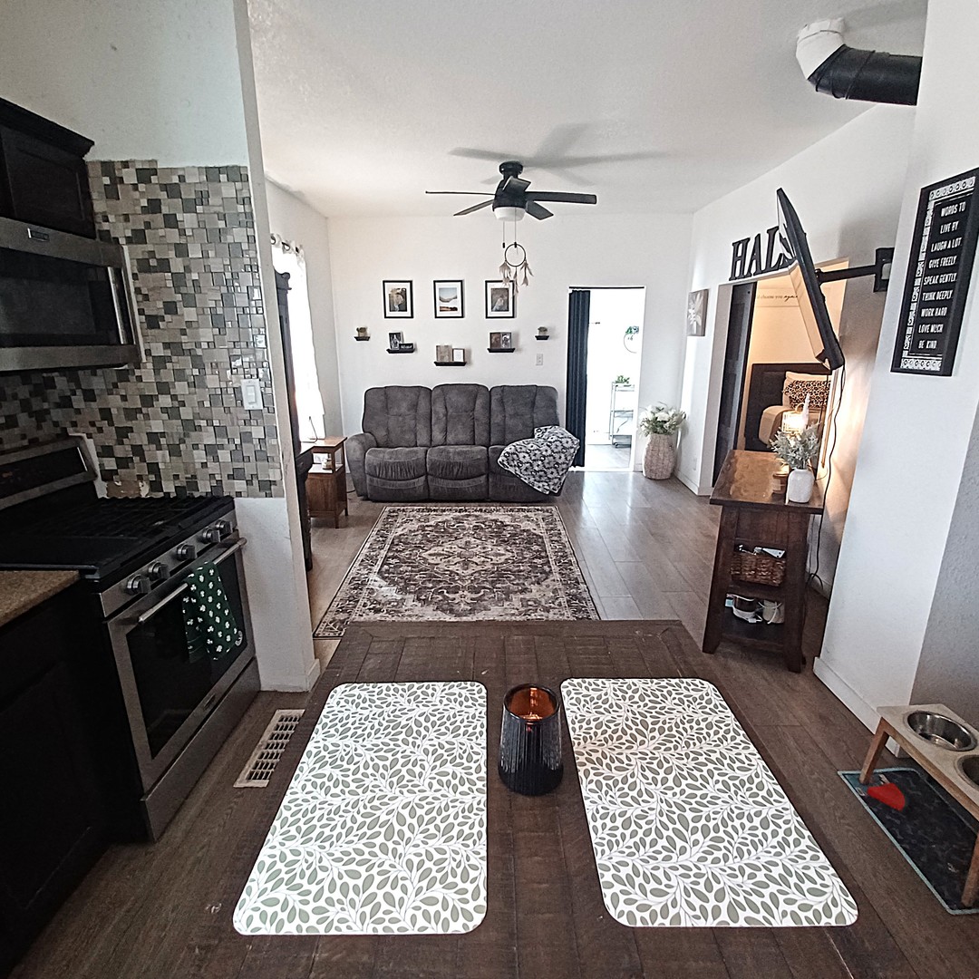 122 South Beach Street Kewanee, IL 61443 - Photo 35 of 49 a living room with furniture and a fireplace