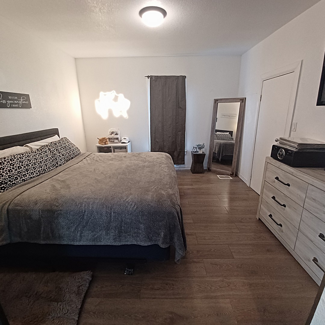 122 South Beach Street Kewanee, IL 61443 - Photo 38 of 49 a bedroom with a bed and a dresser