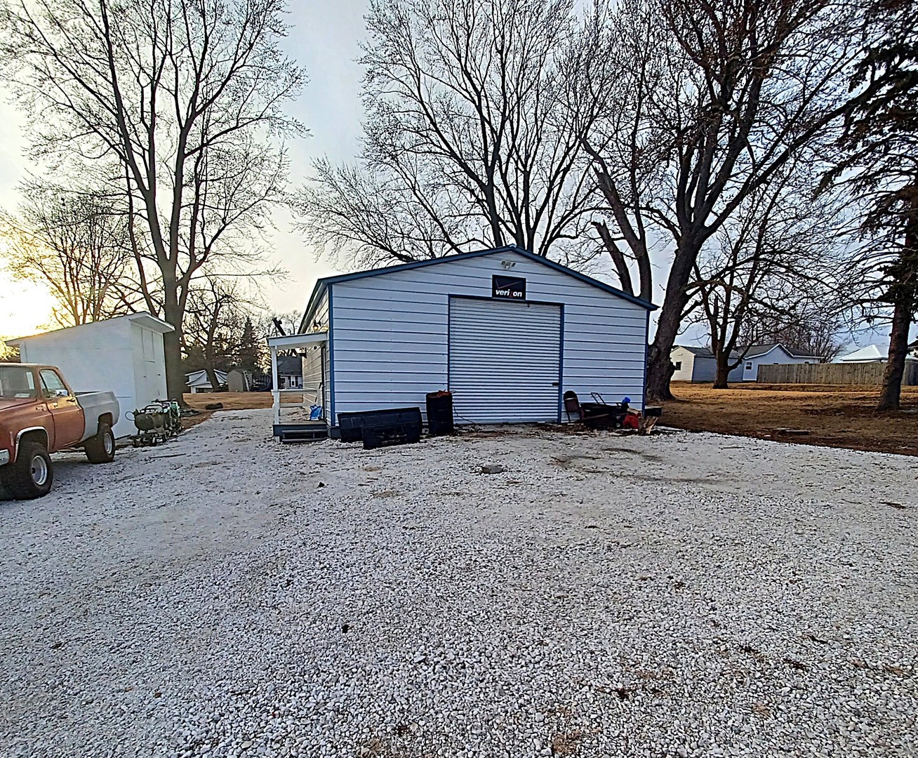122 South Beach Street Kewanee, IL 61443 - Photo 9 of 49 a view of a house with a yard covered in snow