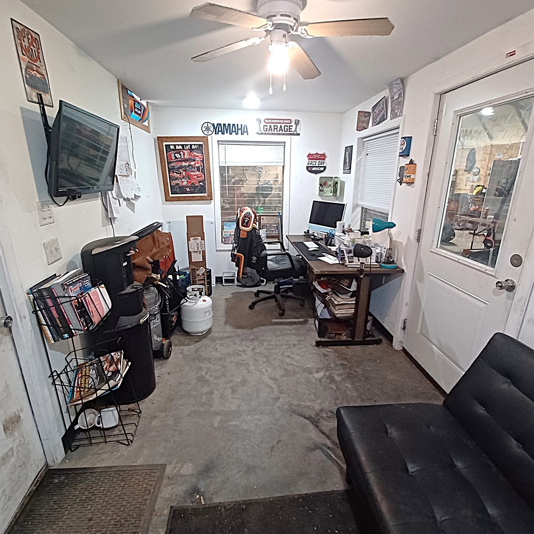 122 South Beach Street Kewanee, IL 61443 - Photo 10 of 49 a living room with furniture and a flat screen tv