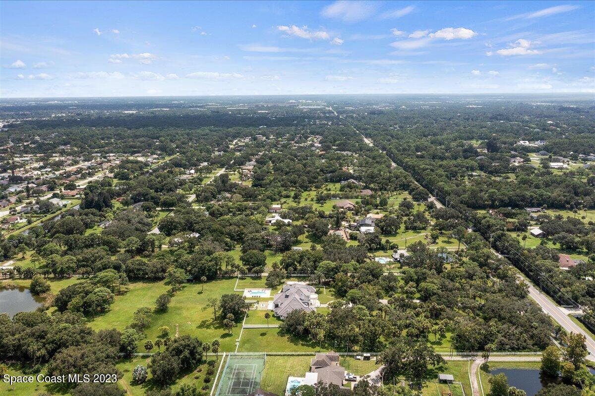 2815 Turtle Mound Road Melbourne, FL 32934 - Photo 109 of 115 an aerial view of residential houses with outdoor space
