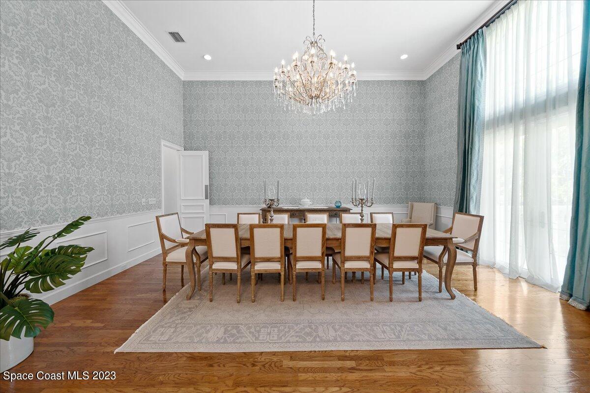 2815 Turtle Mound Road Melbourne, FL 32934 - Photo 17 of 115 a view of a dining room with furniture