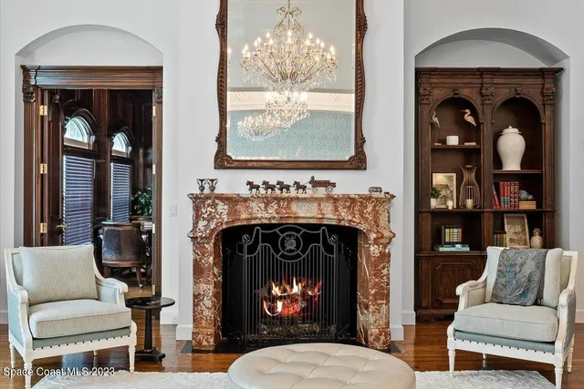 a spacious bathroom with a granite countertop sink a mirror and a bathtub
