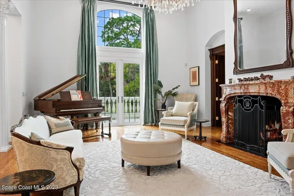 a bathroom with a sink a mirror and a shower curtain
