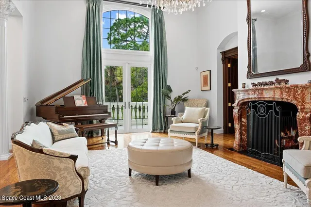 a bathroom with a sink a mirror and a shower curtain