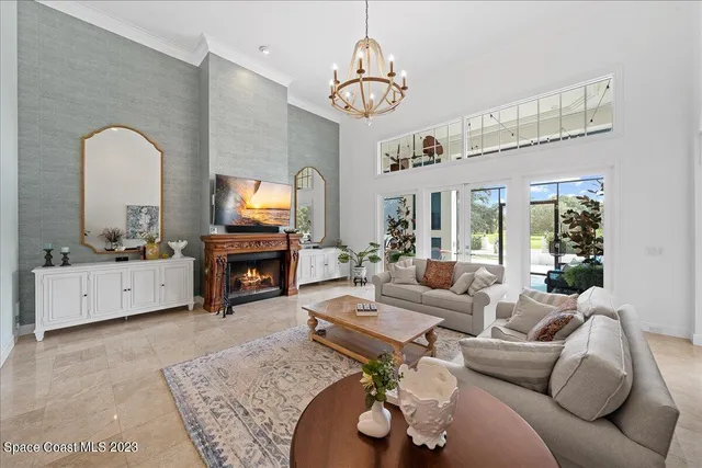 a living room with furniture fireplace and flat screen tv