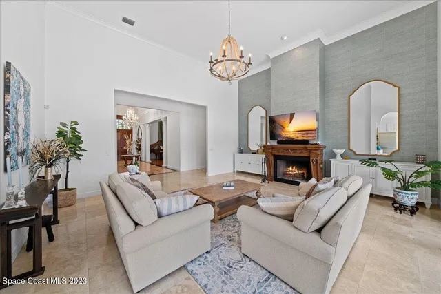 a kitchen with stainless steel appliances granite countertop a sink a stove and a wooden floors