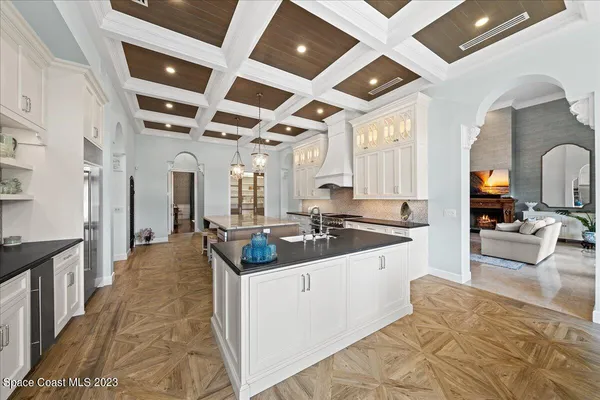 a spacious bedroom with a bed and a window