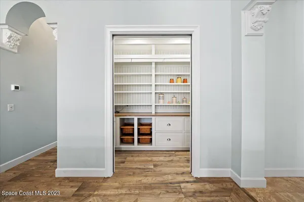 a view of a swimming pool with an outdoor space and seating area