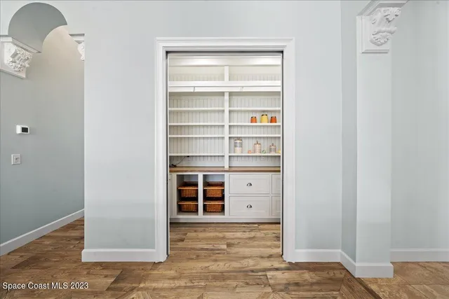 a view of a swimming pool with an outdoor space and seating area
