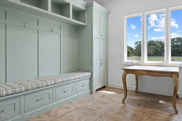 a view of a chair and table of the garden