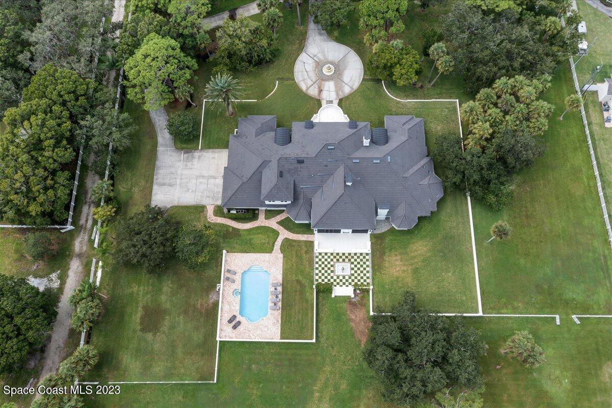 2815 Turtle Mound Road Melbourne, FL 32934 - Photo 7 of 115 an aerial view of a house