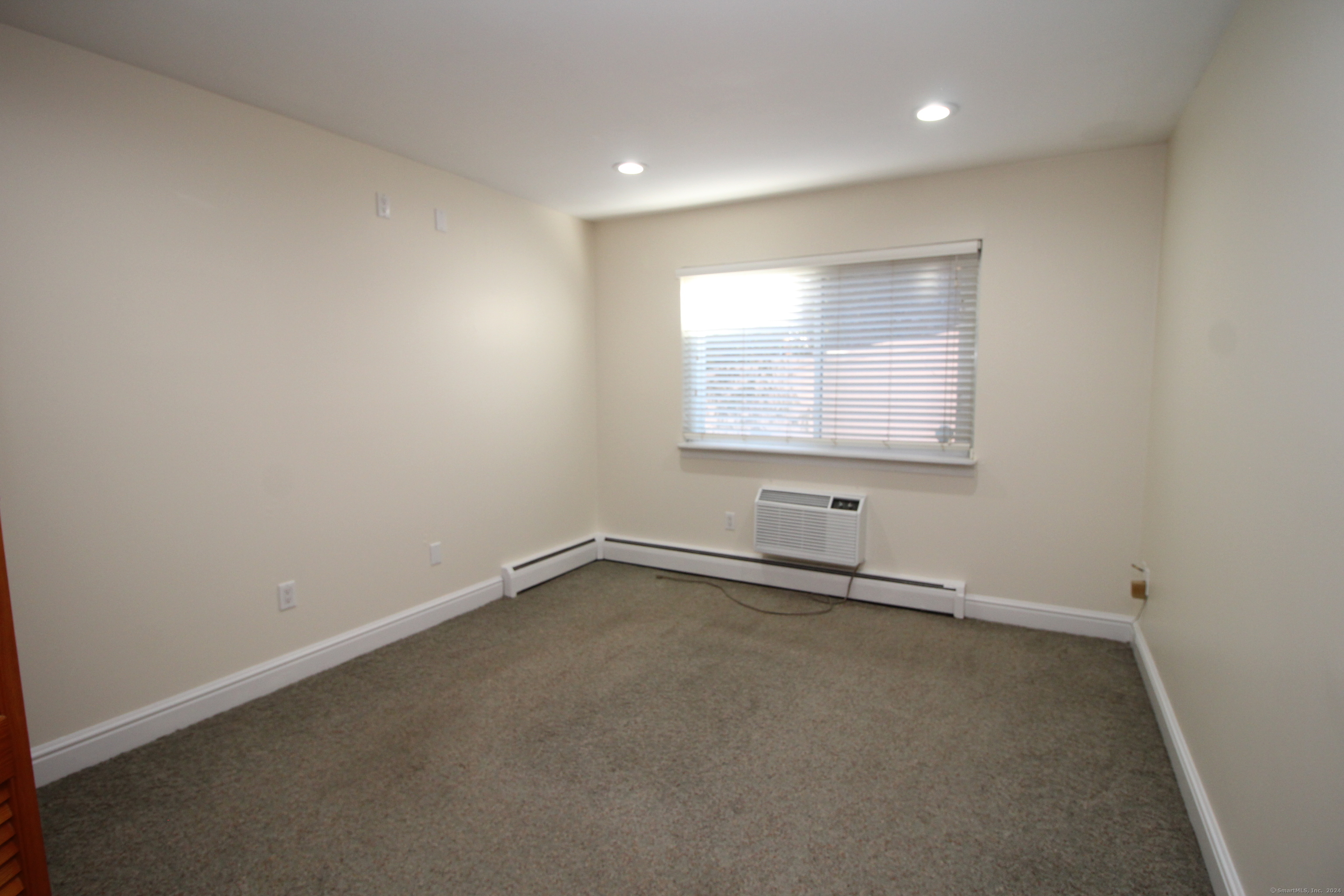 18 Prospect Street, Unit C8 Norwalk, CT 06850 - Photo 10 of 11 an empty room with a window