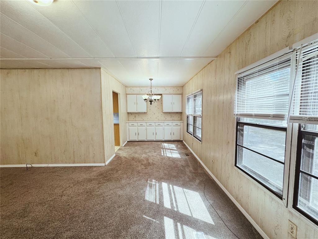 18395 Northwest 4th Terrace Citra, FL 32113 - Photo 13 of 66 a view of kitchen with wooden floor and electronic appliances