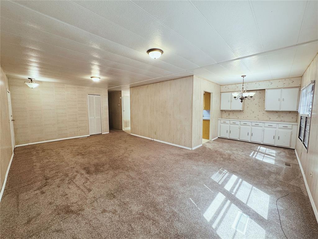 18395 Northwest 4th Terrace Citra, FL 32113 - Photo 14 of 66 a view of empty room with a kitchen