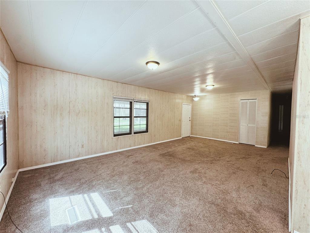 18395 Northwest 4th Terrace Citra, FL 32113 - Photo 15 of 66 an empty room with windows and closet
