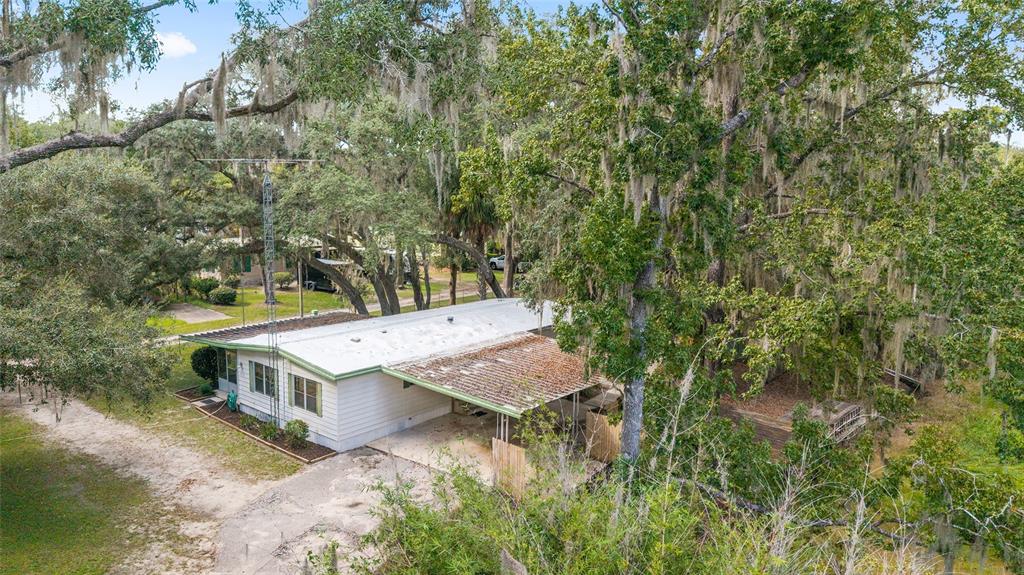 18395 Northwest 4th Terrace Citra, FL 32113 - Photo 33 of 66 a view of a house with a yard and sitting area