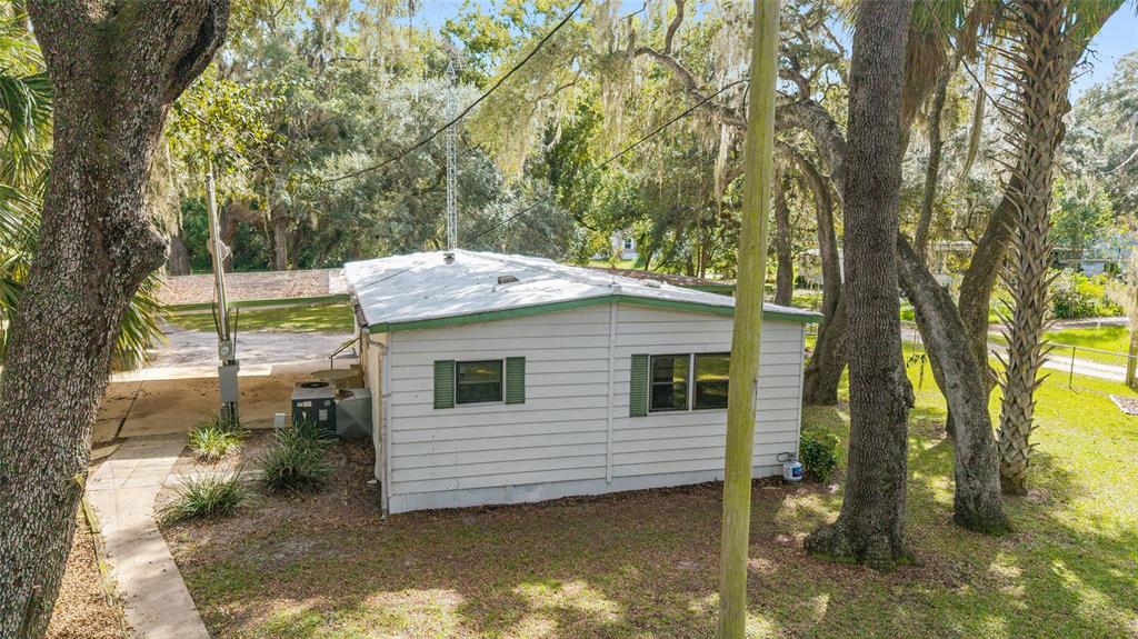 18395 Northwest 4th Terrace Citra, FL 32113 - Photo 36 of 66 a view of a house with a yard