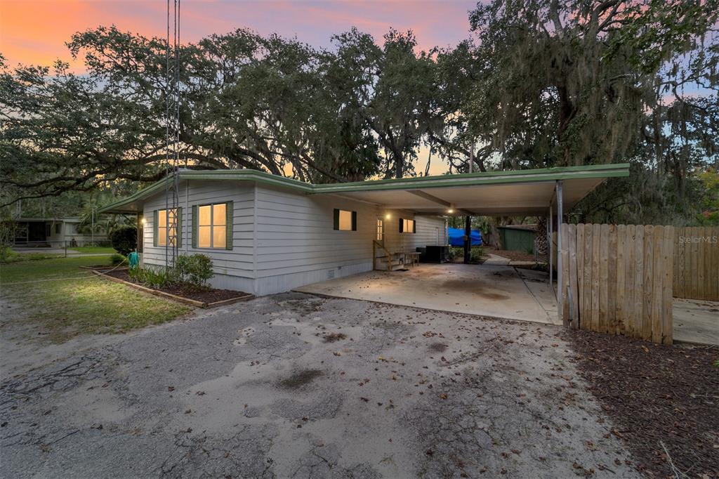 18395 Northwest 4th Terrace Citra, FL 32113 - Photo 48 of 66 a view of a house with backyard and trees