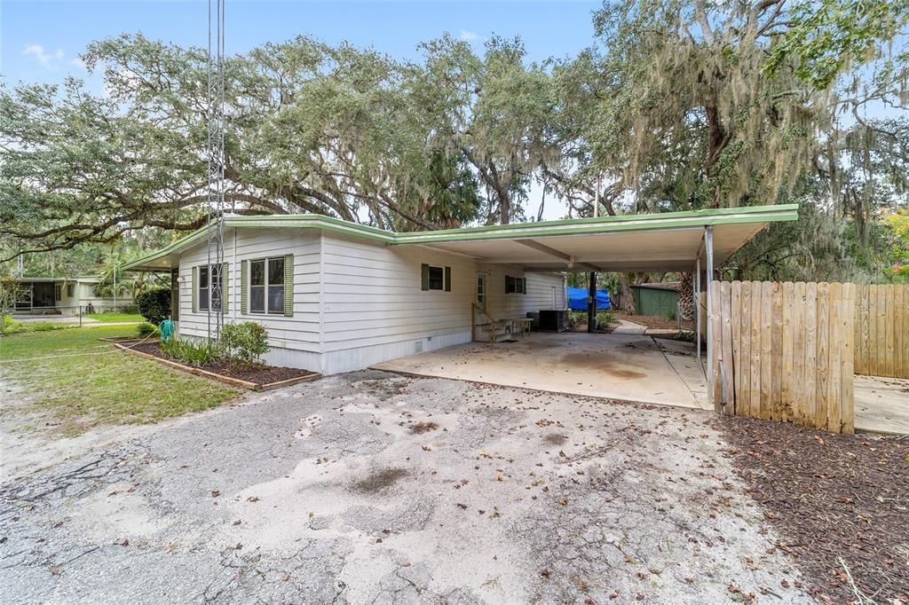 18395 Northwest 4th Terrace Citra, FL 32113 - Photo 49 of 66 a view of a house with a yard and sitting area