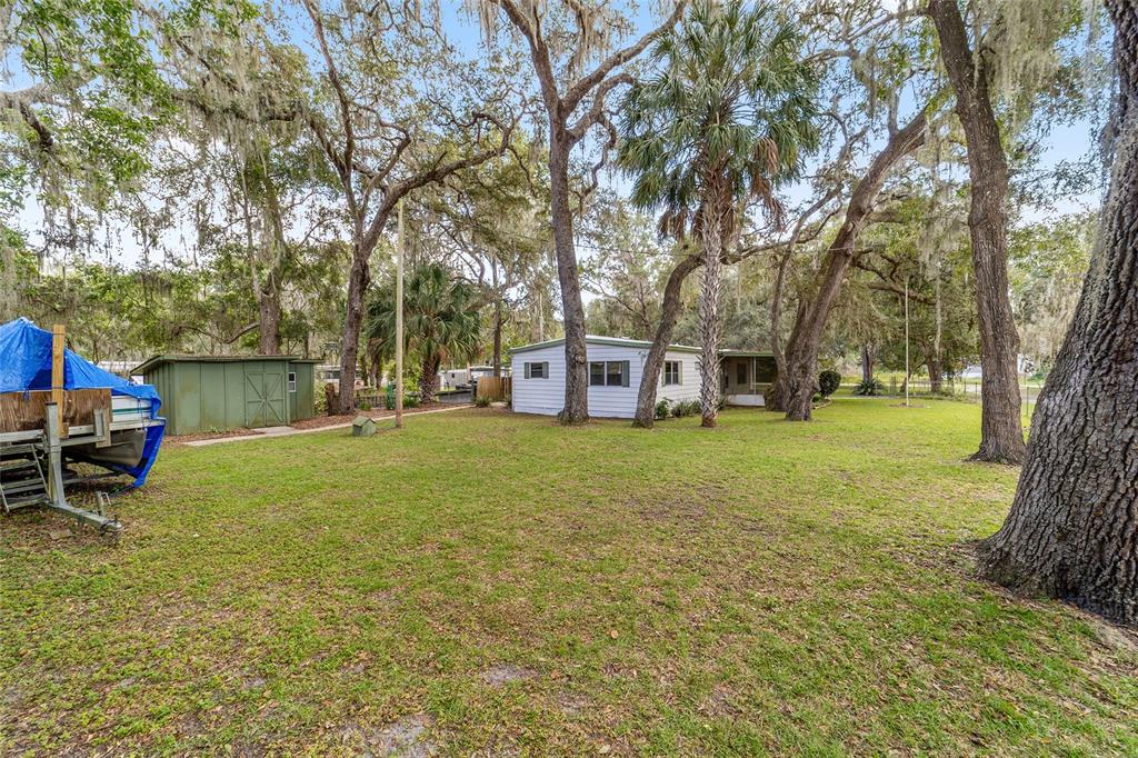18395 Northwest 4th Terrace Citra, FL 32113 - Photo 51 of 66 a view of a house with backyard and sitting area